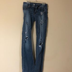 Flair out blue jeans